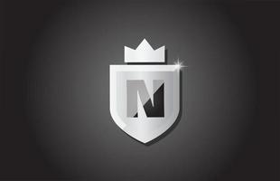 Creative shield N alphabet letter icon logo in grey color. Corporate business design for company template identity with king crown and light spark vector