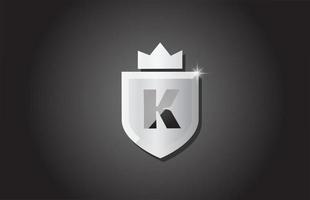 Creative shield K alphabet letter icon logo in grey color. Corporate business design for company template identity with king crown and light spark vector