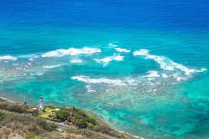 Lighthouse and sea scenery at Oahu, Hawaii, US photo