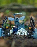 Warsaw 2020 - Lego Harry Potter minifigure running from cemetery photo