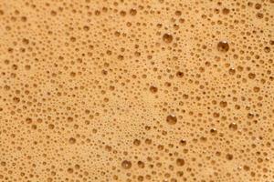 Close up view of coffee foam photo