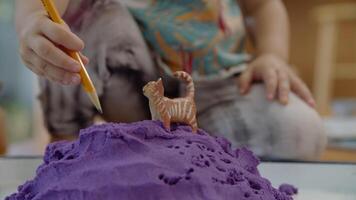 Portrait of modelling clay with toy cat photo