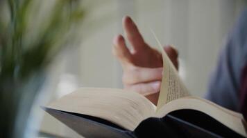 Portrait of man reading book photo