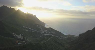 Aerial drone view of the coast coastline ocean sea at sunset in Tenerife, Spain.