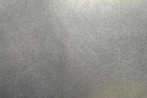 Scratched metal texture, Brushed steel plate background photo