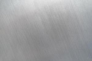 Textura de metal rayado, fondo de placa de acero cepillado foto