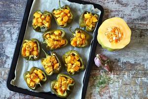 Baked peppers stuffed with pumpkin photo