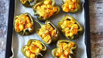 Baked peppers stuffed with pumpkin photo