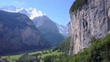 Aerial travel drone view of the Lauterbrunnen Valley and Staubbach Falls, Switzerland.