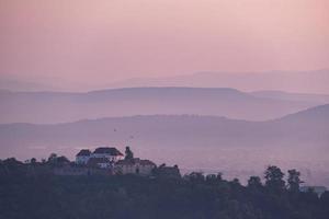 Landscape with old buildings in Romania photo