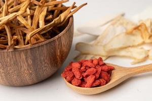 Chinese herb medicine with goji berries for good healthy. photo