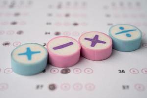 Math symbol on Answer sheet background Education study mathematics learning teach concept. photo