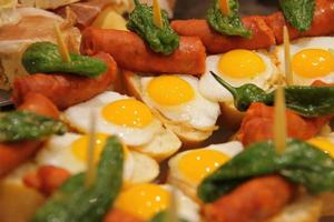 tasty pintxos in Spanish restaurant typical basque snack photo