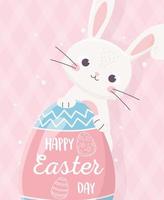 happy easter cute rabbit with egg lettering on pink background vector