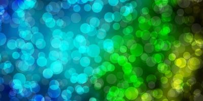 Light Blue Green vector layout with circles Illustration with set of shining colorful abstract spheres Design for your commercials