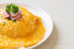 Creamy Omelet with Ham on Rice photo