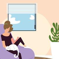 woman with cat sitting on bean chair in the room vector