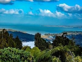 A view of the countryside from a hill overlooking the Waitakere Dam, Auckland, New Zealand