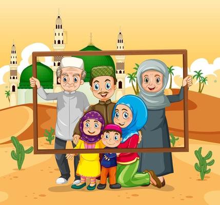 Happy family holding photo frame with mosque on the background