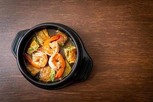 Sour soup made of Tamarind Paste with Shrimps and Vegetable Omelet photo