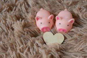 Piggy bank metaphor saving love for lover or family in every day.Concept of happy relationship.