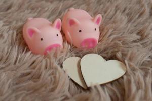 Piggy bank metaphor saving love for lover or family in every day.Concept of happy relationship.