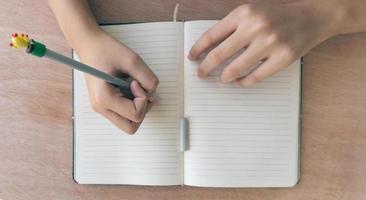 Writing in a notebook photo