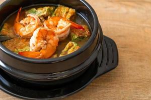 Sour soup made of Tamarind Paste with Shrimps and Vegetable Omelet photo