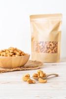 Cashew nuts in wooden bowl photo