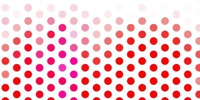 Light pink red vector background with spots