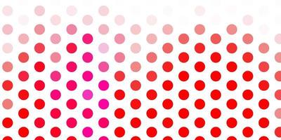 Light pink red vector background with spots