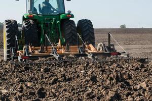 Farm Tractor Working photo