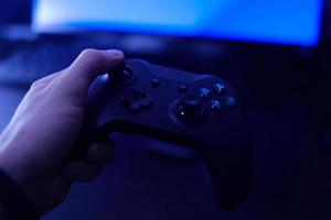 Gamepad, game controller in the hand photo