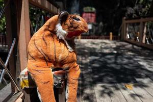 A damaged stuffed animal tiger in Langkawi in Malaysia photo