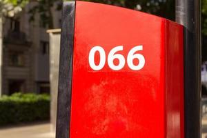 Number 066, number on red background photo