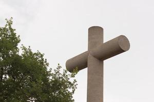 Stone cross, religious symbol photo