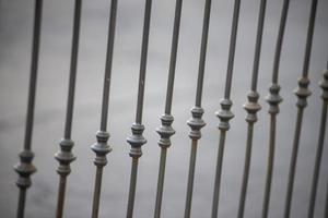 symmetrical detail of an iron railing photo