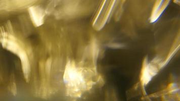 kinetische waterige gouden lichtlekken video
