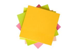 Top view of colorful sticky note papers isolated on white photo