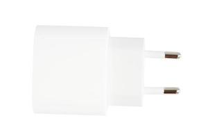 Top view of black phone AC charger and USB cable on white background photo