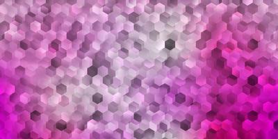 Light pink vector backdrop with a batch of hexagons