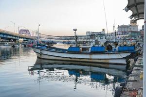 Fishing boats docked at a fishing village in Korea photo