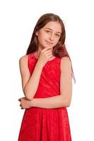 Teenage girl in a red dress on a white background