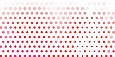 Light pink vector background with spots.