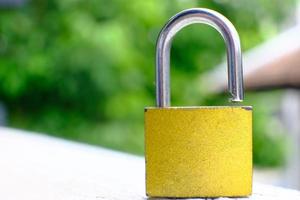 Padlock on table background and business security concept, protecting data personal information photo