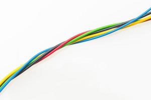 Colored wires on white background photo