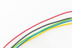 Colored wires on white background photo