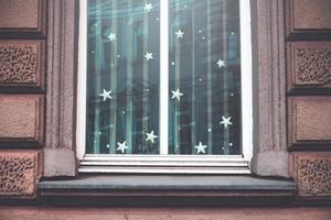 Fairy tale window in soft light with stars photo
