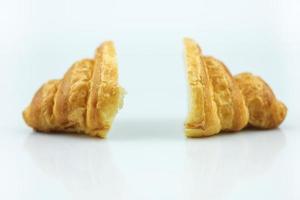 Plain croissant on white background photo