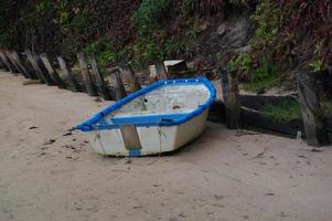 Dinghy on Beelbi Creek bank at Toogoom photo